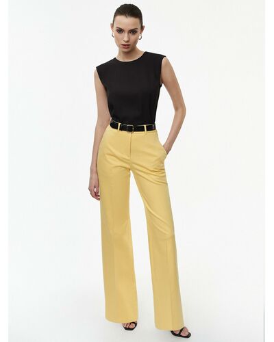 Брюки клеш женские желтые CA-316650024-008 от byME 