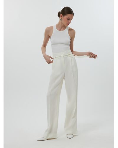 Женские удлиненные брюки со льном цвет экрю от Calista 