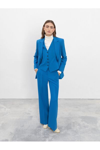 Прямые женские брюки из костюмной ткани цвет аква от byME 