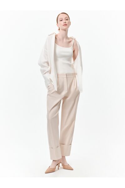 Брюки с широкими манжетами от byME 