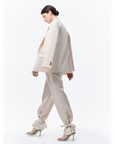 Широкие брюки с хлястиками от byME 