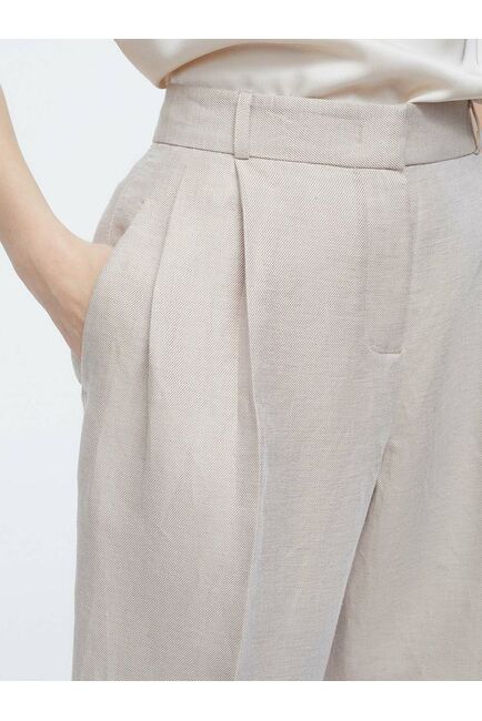 Льняные брюки с защипами от byME 