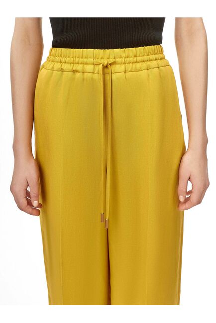 Брюки женские на резинке жёлтые от byME 