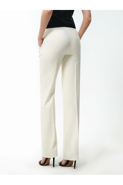 Классические брюки на средней посадке молочные от byME 
