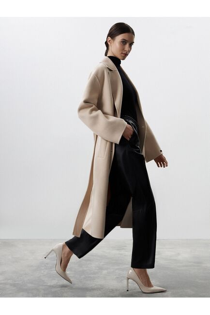 Женские прямые брюки на резинке из экокожи от byME 