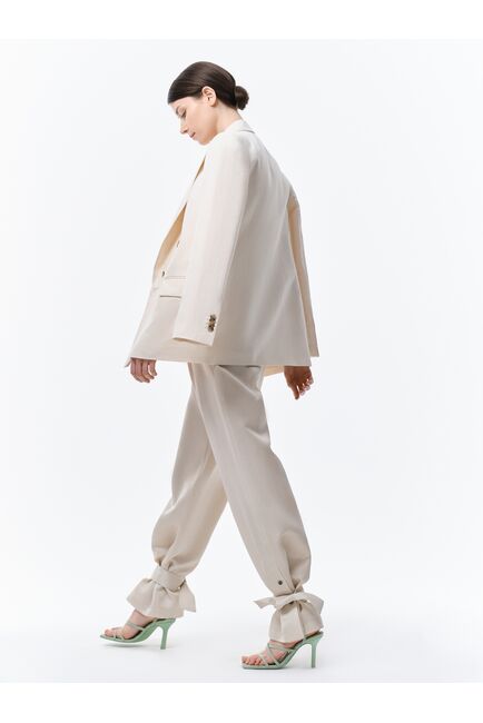 Широкие брюки с хлястиками от byME 