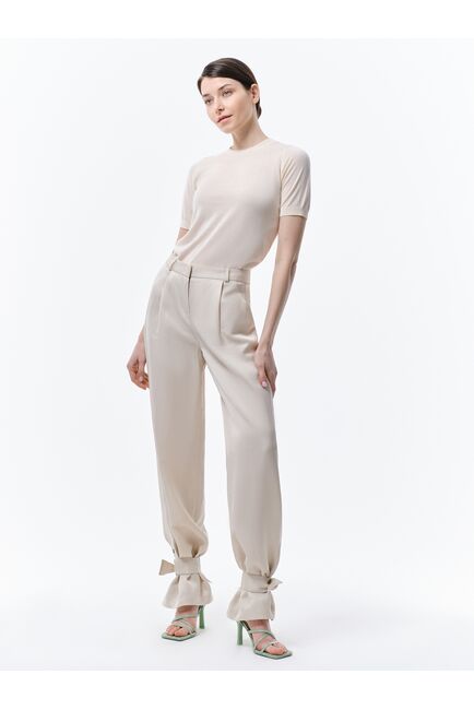 Широкие брюки с хлястиками от byME 