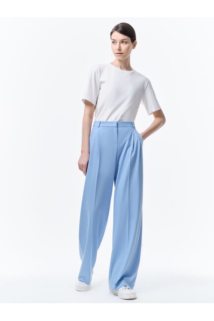 Широкие брюки с защипами голубые от byME 