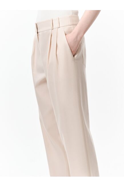 Брюки с широкими манжетами от byME 