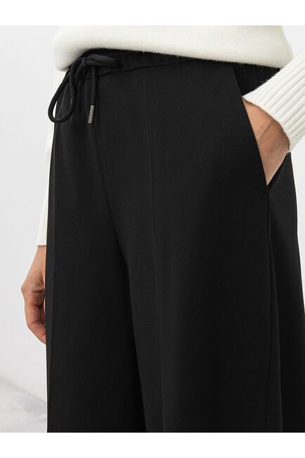 Джоггеры из костюмной ткани от Calista 