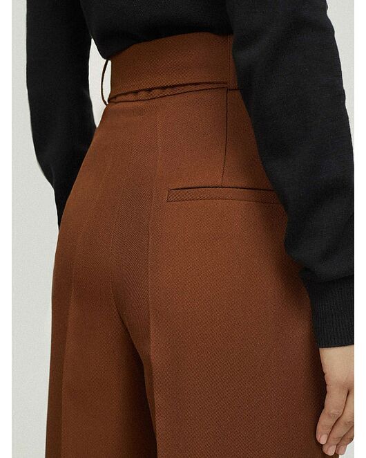 Брюки с защипами и поясом от ByME 