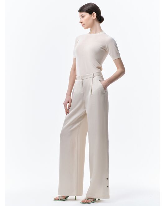 Широкие брюки с хлястиками от ByME 