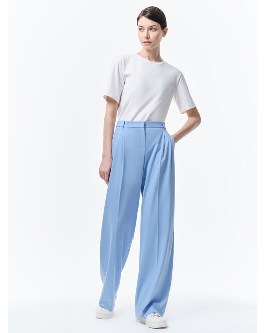 Широкие брюки с защипами голубые от byME 