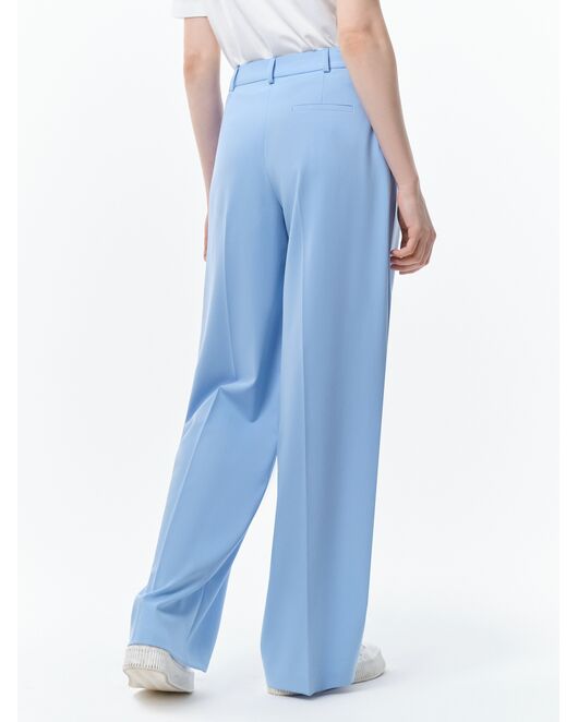 Широкие брюки с защипами голубые от byME 