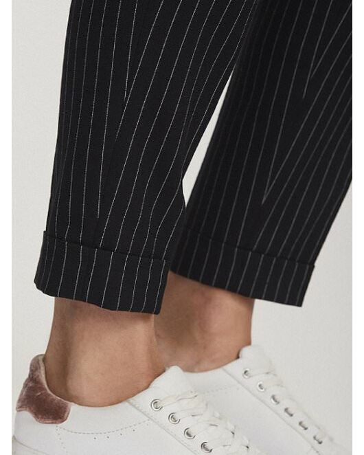 Брюки с отворотами и поясом от byME 